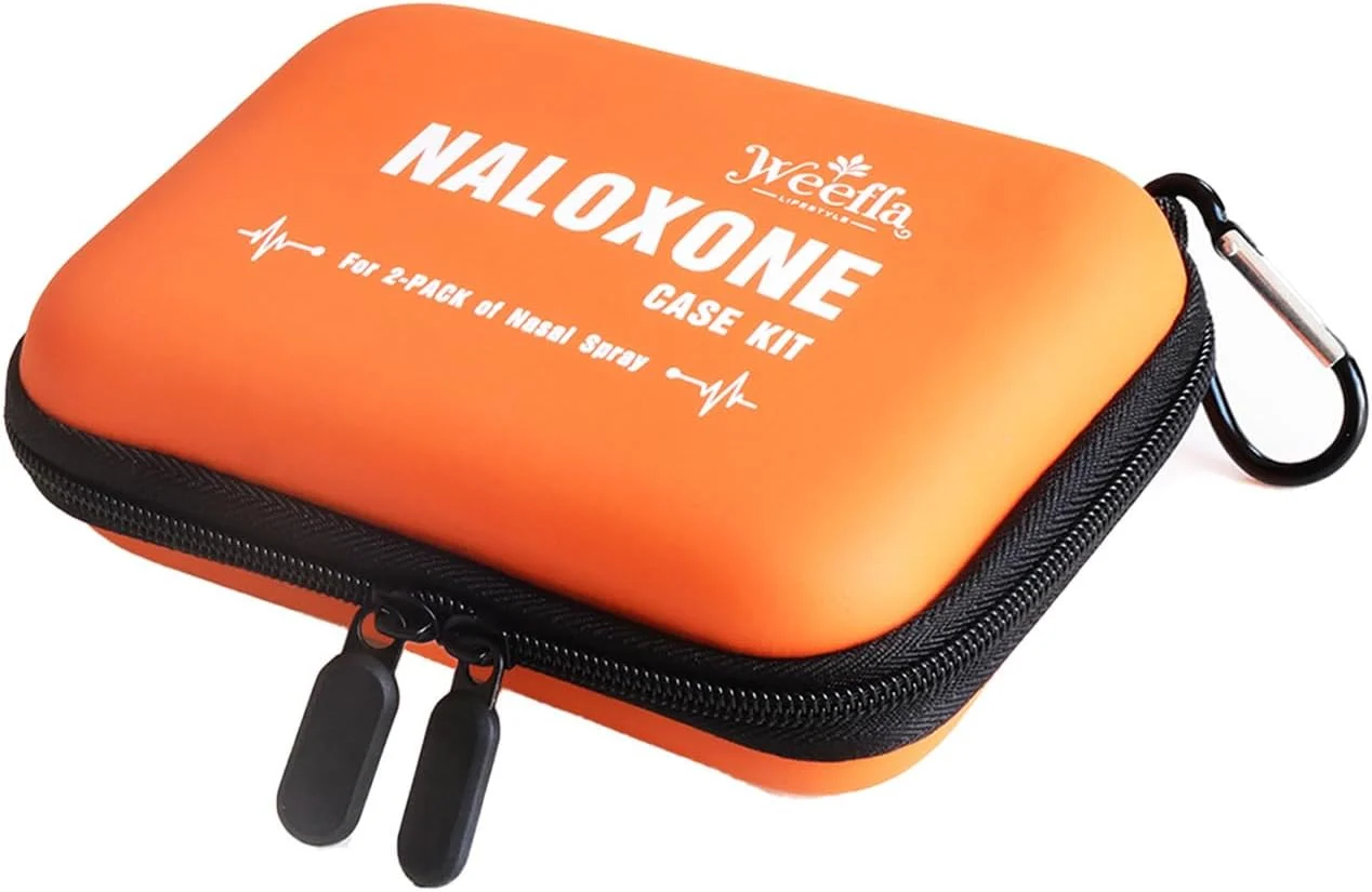 An orange Naloxone Carrying Case with a black zipper and carabiner, labeled "Naloxone Case Kit" and "For 2-pack of nasal spray" in white text on the front.